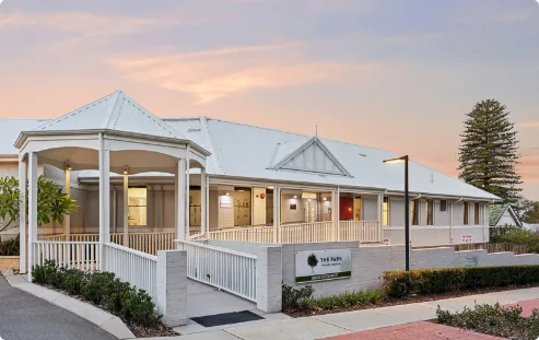 The hospital front entrance at sunset